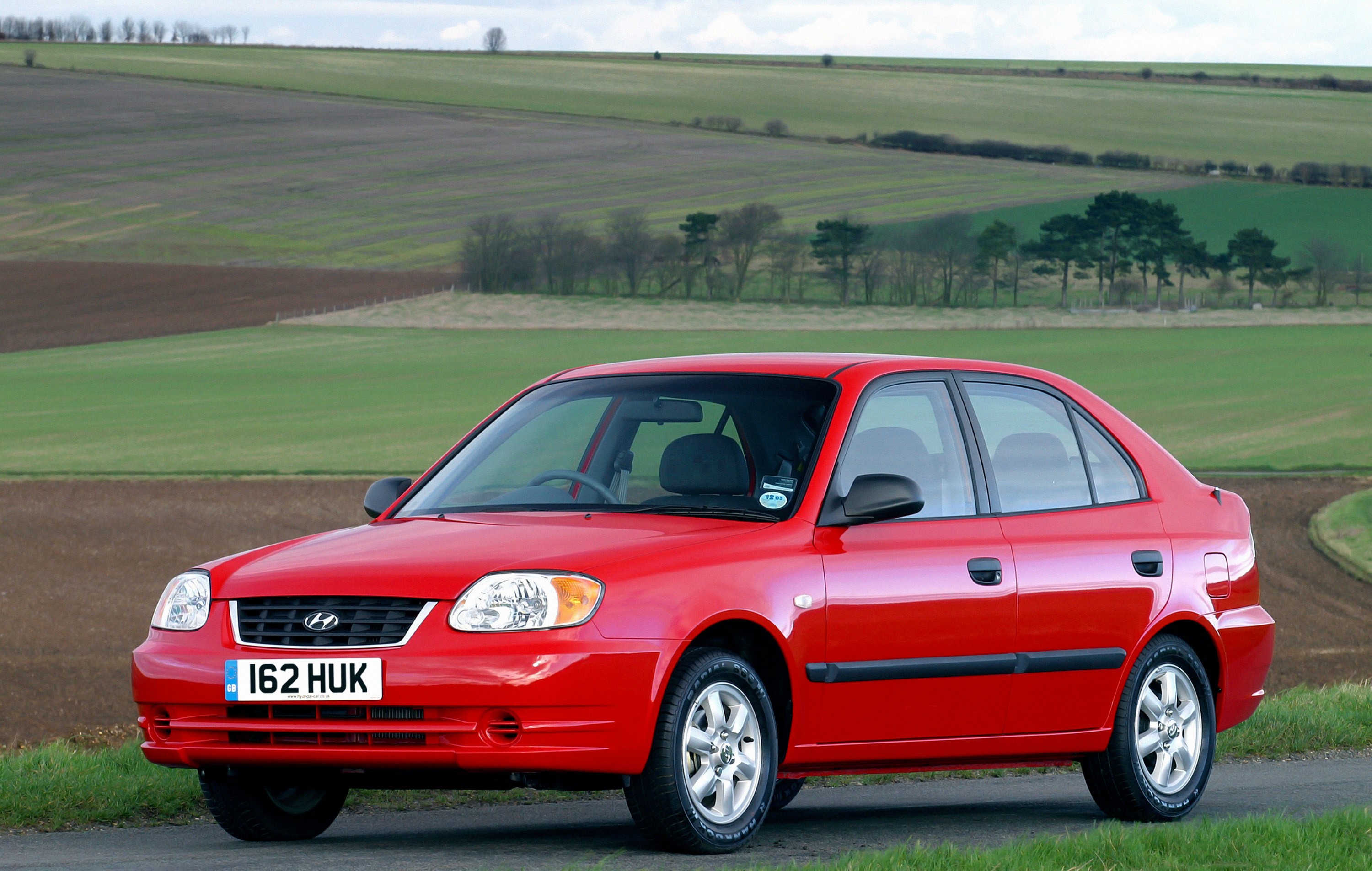 Хендай акцент 1.3. Hyundai Accent 2003. Hyundai Accent Hatchback 2005. Hyundai Accent 1. Хендай акцент 1 поколения.